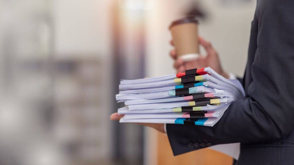 Official documents being held by a lawyer.