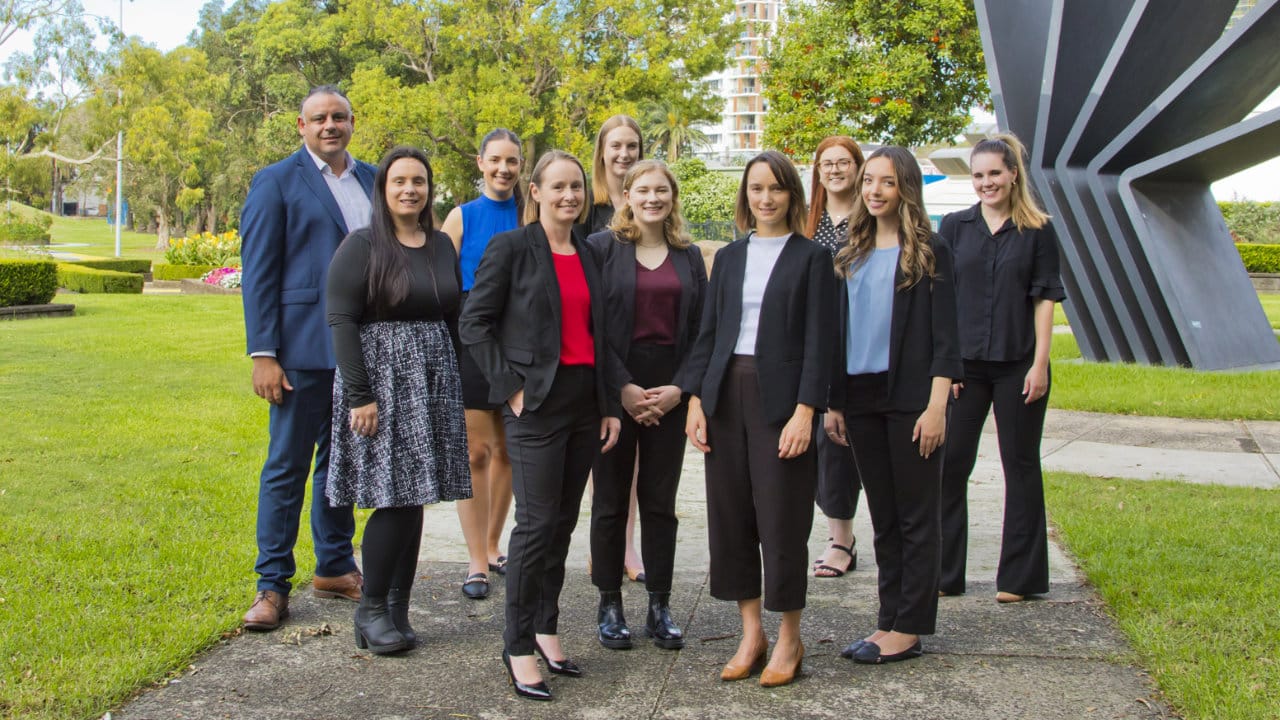 Lawyers discussing conveyancing at PDC Law firm in Wollongong.