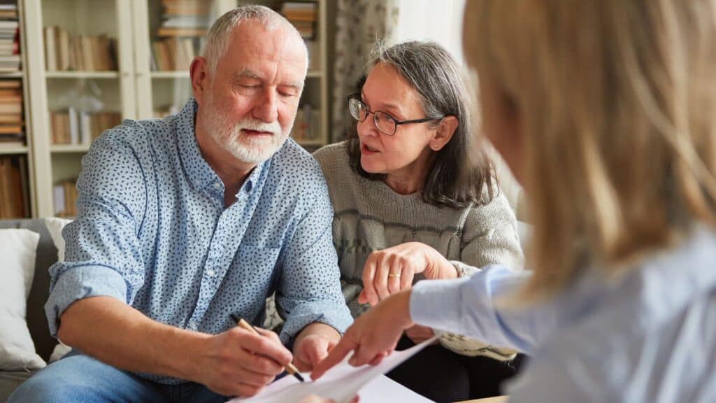 Wollongong lawyer discussing power of attorney with clients.